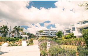 Exclusive Two-Bed Coastal Apartment in Pure South