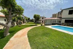 Forcat - Apartamento con jardín y piscina.