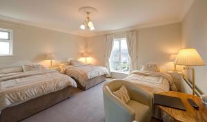 Deluxe Triple Room with Sea View room in Carrabaun House