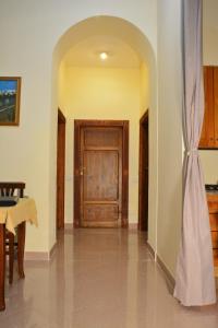 Four-Bedroom Apartment with Garden View room in Villa Regina