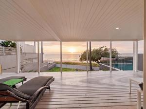 The Pink Door, Absolute Beachfront House