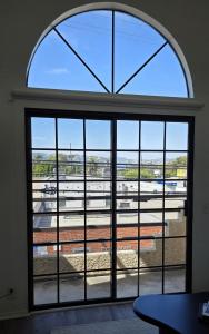 Stylish 2 Bedroom plus Loft with Rooftop Patio and Views Near Beverly Hills, Walk to Restaurants and Markets