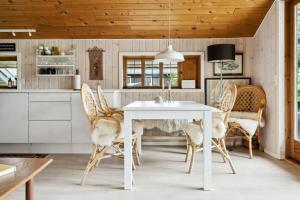 House By Forest And Roskilde Fjords Waves
