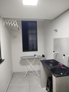 Apartamento novo 1o andar central com ar condicionado garagem tv smart