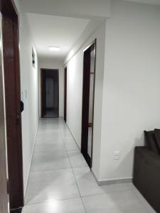 Apartamento novo 1o andar central com ar condicionado garagem tv smart