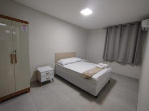 Apartamento novo 1o andar central com ar condicionado garagem tv smart