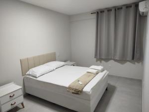 Apartamento novo 1o andar central com ar condicionado garagem tv smart