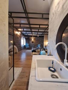 Artistic Stone Loft by the Port