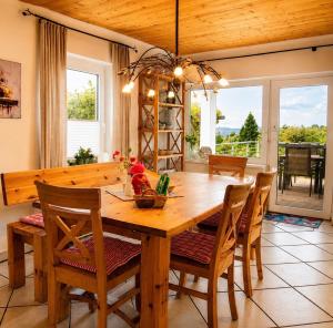 EulenHorst - Ferienhaus in Seeboden am Millstätter See mit Sonnenterasse & Bergblick