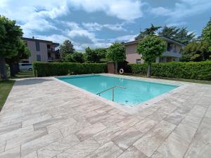 Casa Lugana 19 - monolocale con piscina direttamente a lago