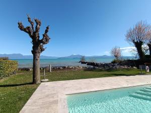 Casa Lugana 19 - monolocale con piscina direttamente a lago