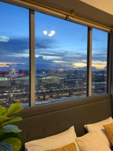 Condotel across NAIA Terminal 3 at One Palm Tree Villas