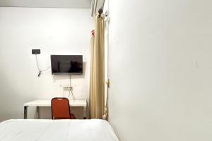 Tulip Syariah RedPartner near T2 Juanda Airport