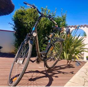 chambre privée climatisée cuisine dété piscine vélo