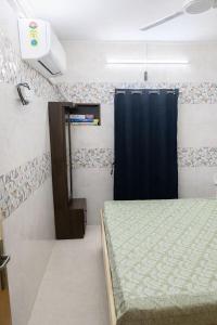 1BHK Recliners 55 Inchs LED Netflix Near Juhu Airport Nanavati Parle