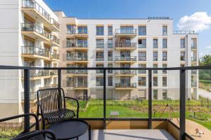Stylowy Apartament z Balkonem Parkingiem oraz Dostępem do Siłowni by Noclegi Renters
