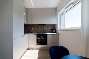 Lasek Marceliński 12th Floor Studio by BookingHost