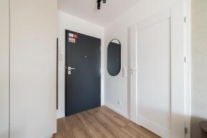 Lasek Marceliński 12th Floor Studio by BookingHost