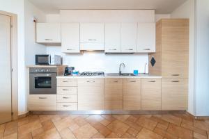 Appartamento con parcheggio, Smart Tv & Wifi
