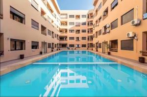 Élégant appartement avec piscine parking Wifi au centre Gueliz