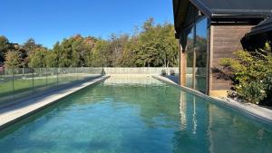 1BR home with heated pool and mountain view