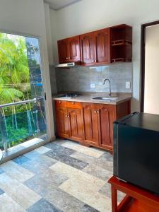 Apartaestudio moderno con aire y cocina