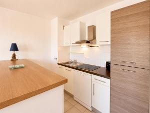 La Palmeraie T2, terrasse, clim, pkg, centre ville