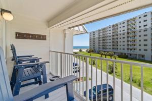 Third-floor condo with pool hot tub partial ocean view gym & central AC