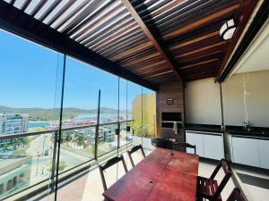 Alto Padrão vista lateral mar Jacuzzi privativa e piscina no condomínio