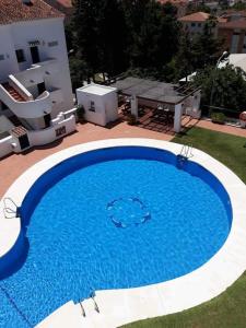 Pool-View Apartment with Terrace & Lift in Pueblo del Parque