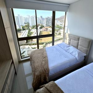 Central 2BR Apt with Great Location and Top Amenities