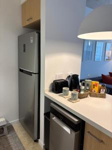 Moderno y cálido en Officia Pilar con piscina y cowork
