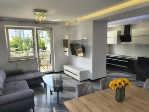 Apartament SPACE & SUN z wewnętrzym ogrodzonym parkingiem