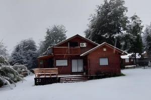 Cabaña Tinaja y vista al volcán