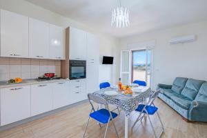 Le Bianche Apt 4 - terrace near the Sea - Happy Rentals