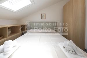 5 Centro - Trilocale con terrazza vista mare Porto Faro