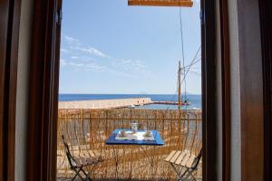 Il Balcone sul molo di Malfa