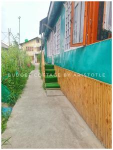 Budget Cottage By Aristotle