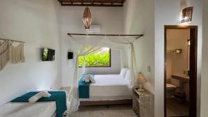 Casa Flor de Dendê Trancoso