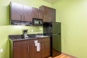 Deluxe Queen Room with Two Queen Beds - Non-Smoking - single occupancy - Non-refundable room in Super 8 Extended Stay by Wyndham Kenedy