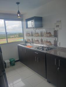 Apartamento con piscina cerca al parque del café