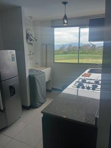 Apartamento con piscina cerca al parque del café