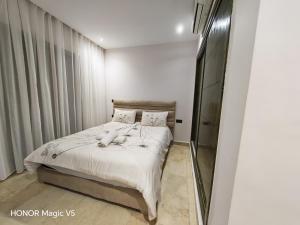 Maison de luxe dans une résidence fermée avec Piscine communautaire & Free Parking,NR 63 à Marina