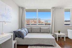 Stylish 2BR condo with 2 Balconies & Workspace