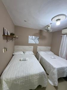 1 Habitacion con 2 camas dobles, en vivienda compartida en Azua