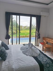 Villa kirtya ubud two-bedroom villa with a pool