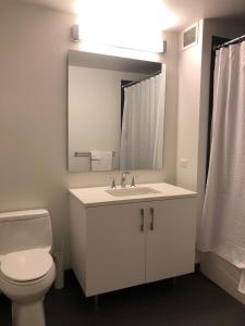 30days min stay Studio Nr Grand Central and UN Washer Dryer in units Free Lounge and Gym