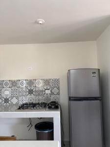 House with 2 bedrooms, 1 full bathroom and 1 guest bathroom, AC And Wi-Fi