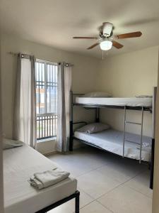 House with 2 bedrooms, 1 full bathroom and 1 guest bathroom, AC And Wi-Fi