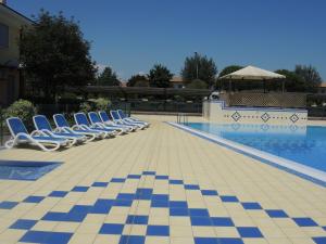 Lovely holiday home with fenced garden and pool